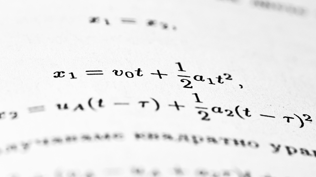 Mathematical equations written on a page with clean notation