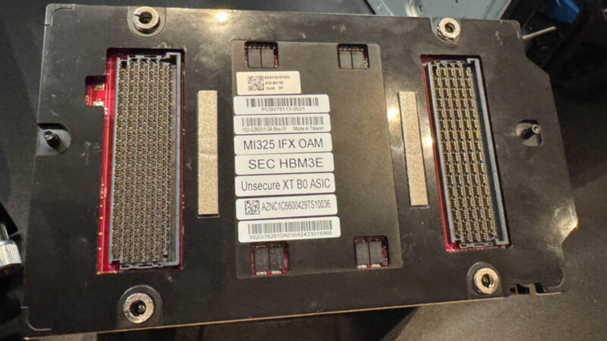 AMD Instinct MI325X OAM module with HBM3e memory stacks visible