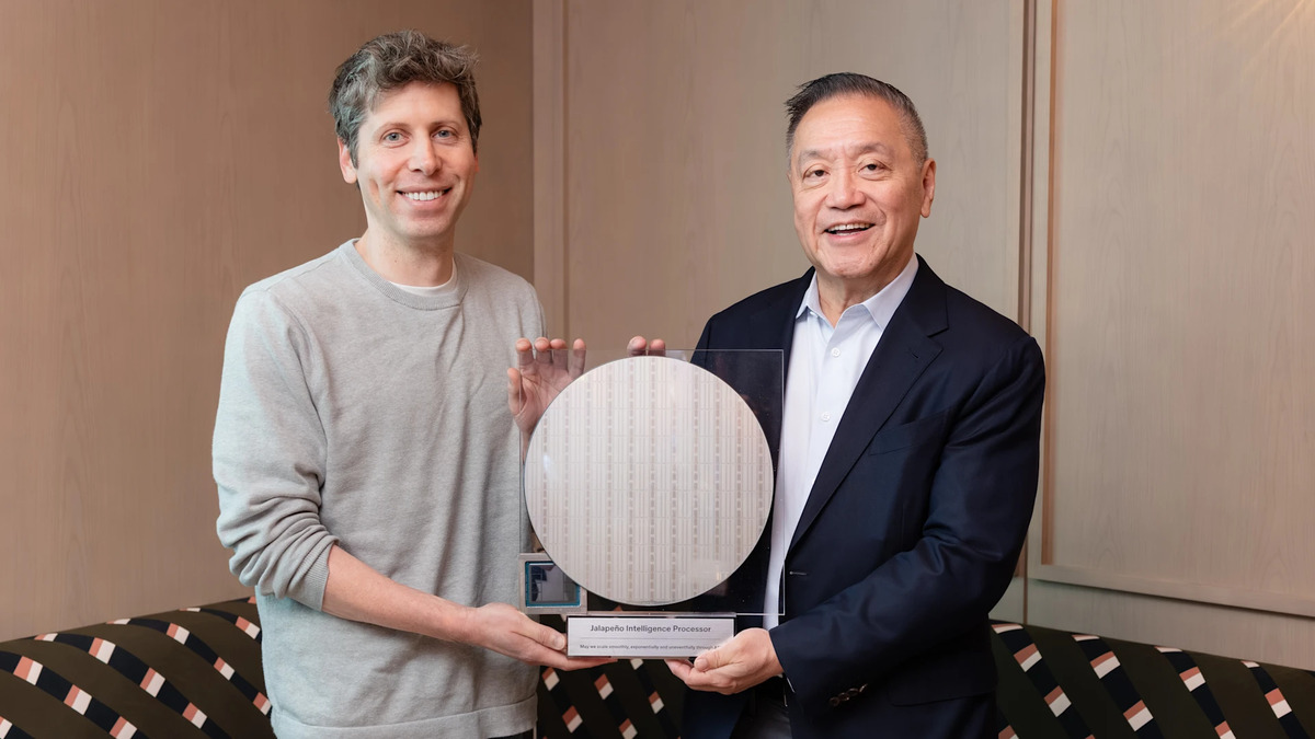 OpenAI CEO Sam Altman and Broadcom CEO Hock Tan hold the first Jalapeño wafer during the chip's June 24 announcement
