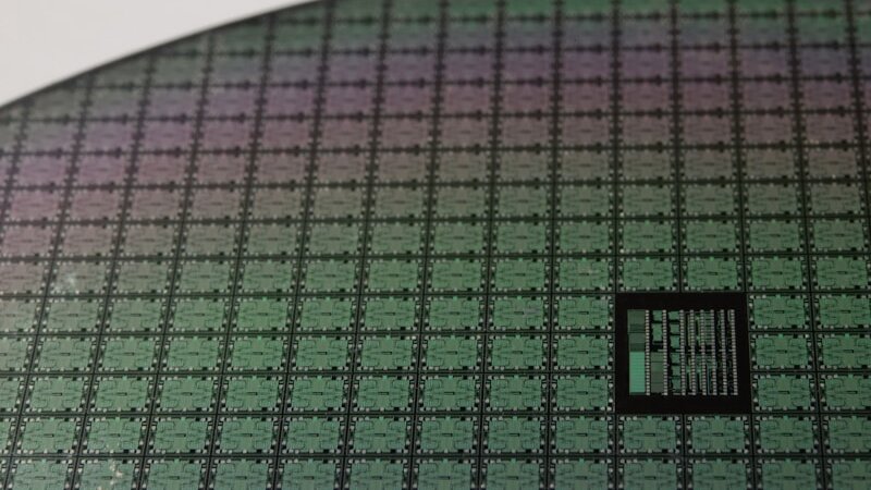 Silicon chip wafer close-up - the physical substrate where small language models run