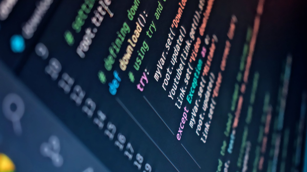A close-up of colorful syntax-highlighted source code on a screen