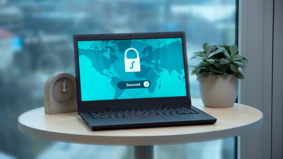 Laptop displaying a security interface with a lock icon representing access control