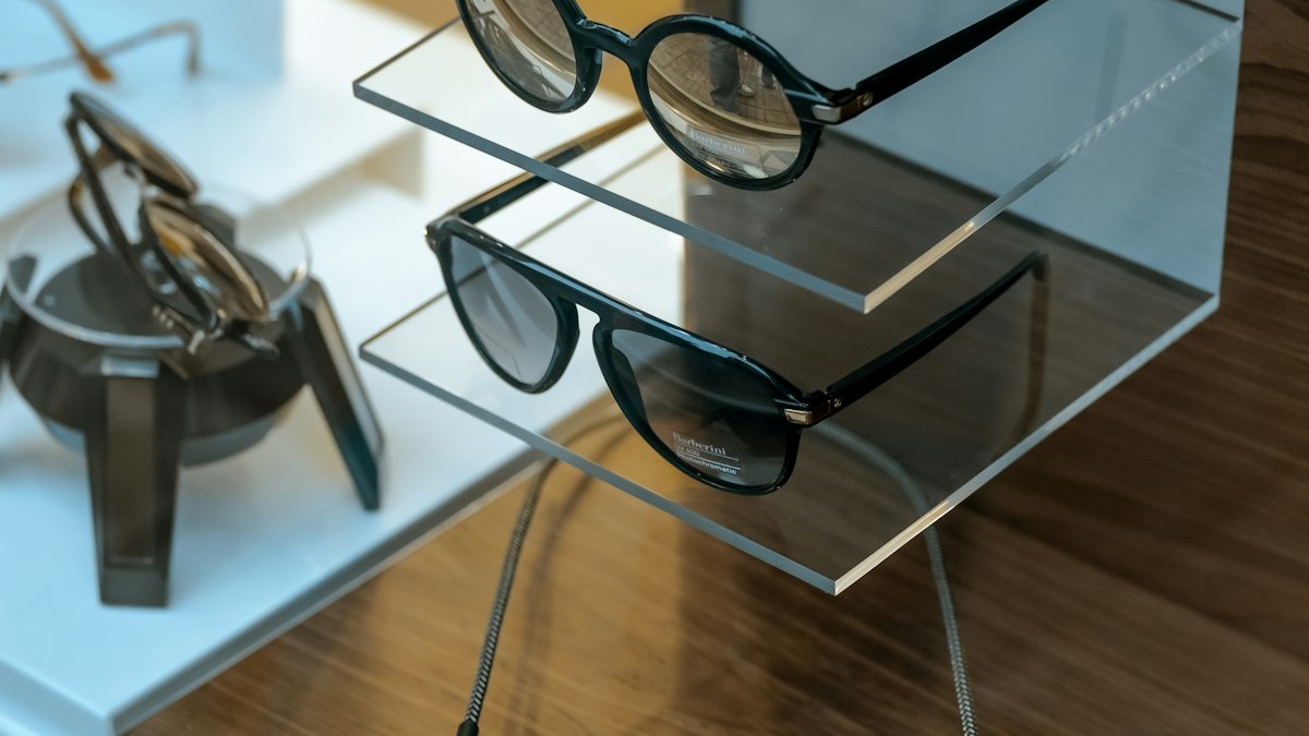 Smart glasses on a retail display shelf, representative of the growing AI eyewear market