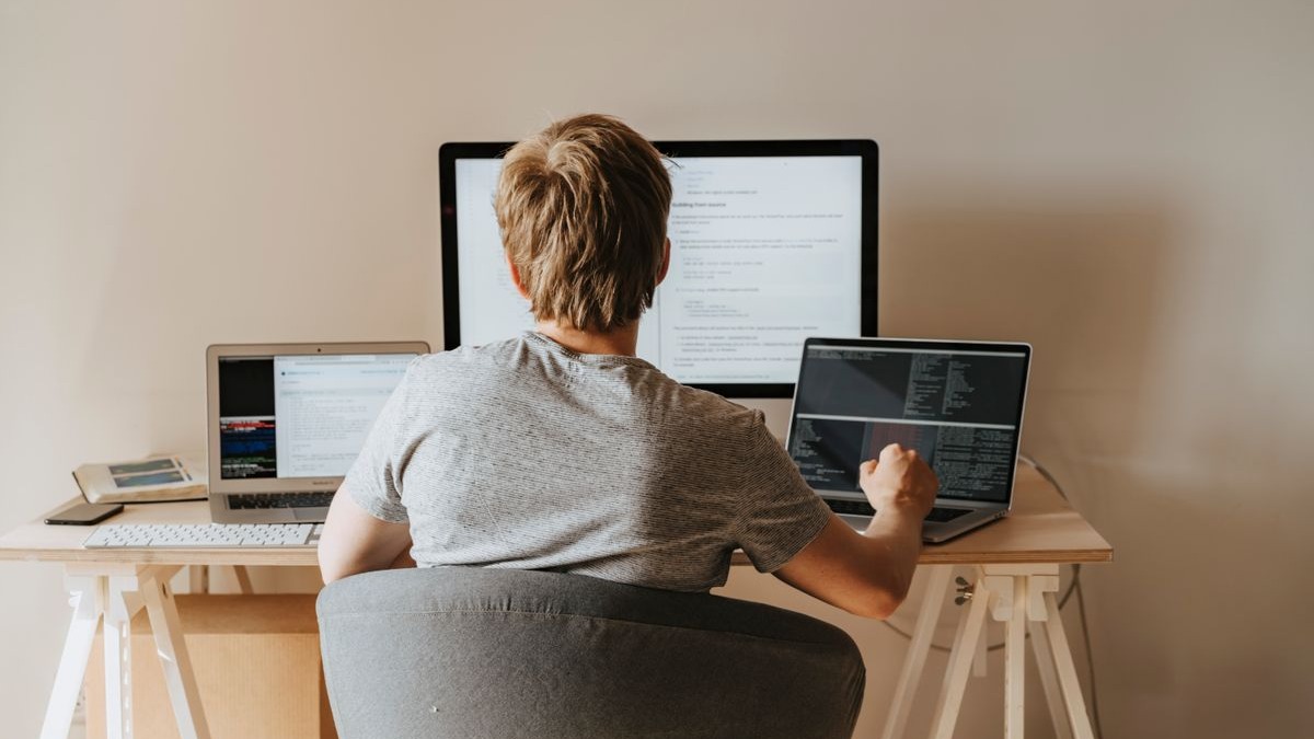 Crowdworkers completing tasks on computers in an office environment