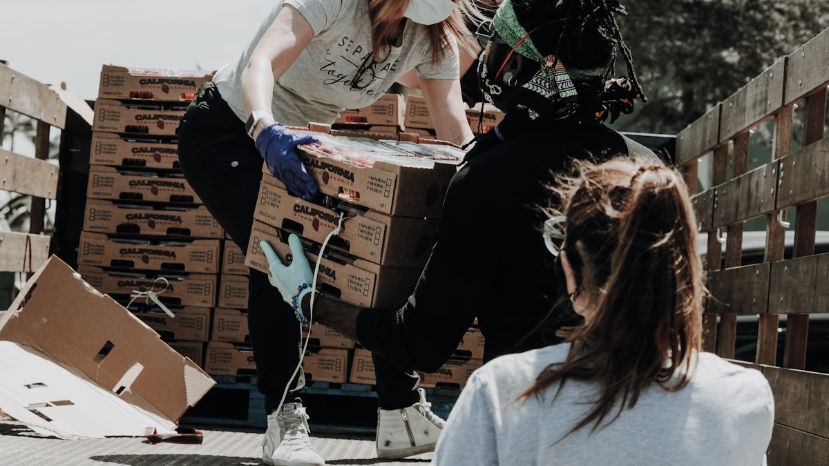 Volunteers working at a community food distribution event