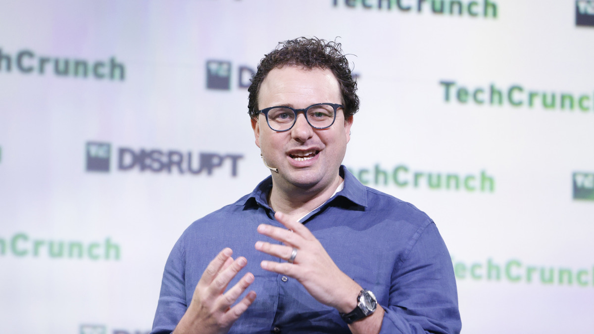 Dario Amodei speaking on stage at TechCrunch Disrupt