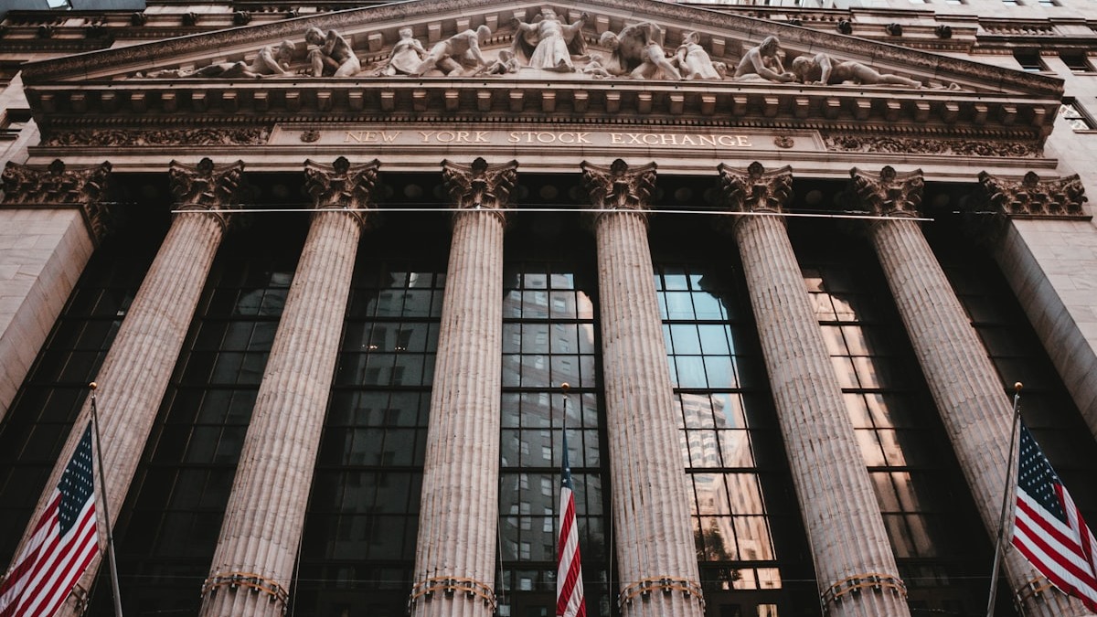 The New York Stock Exchange building on Wall Street, where several of Anthropic's financial services clients are headquartered