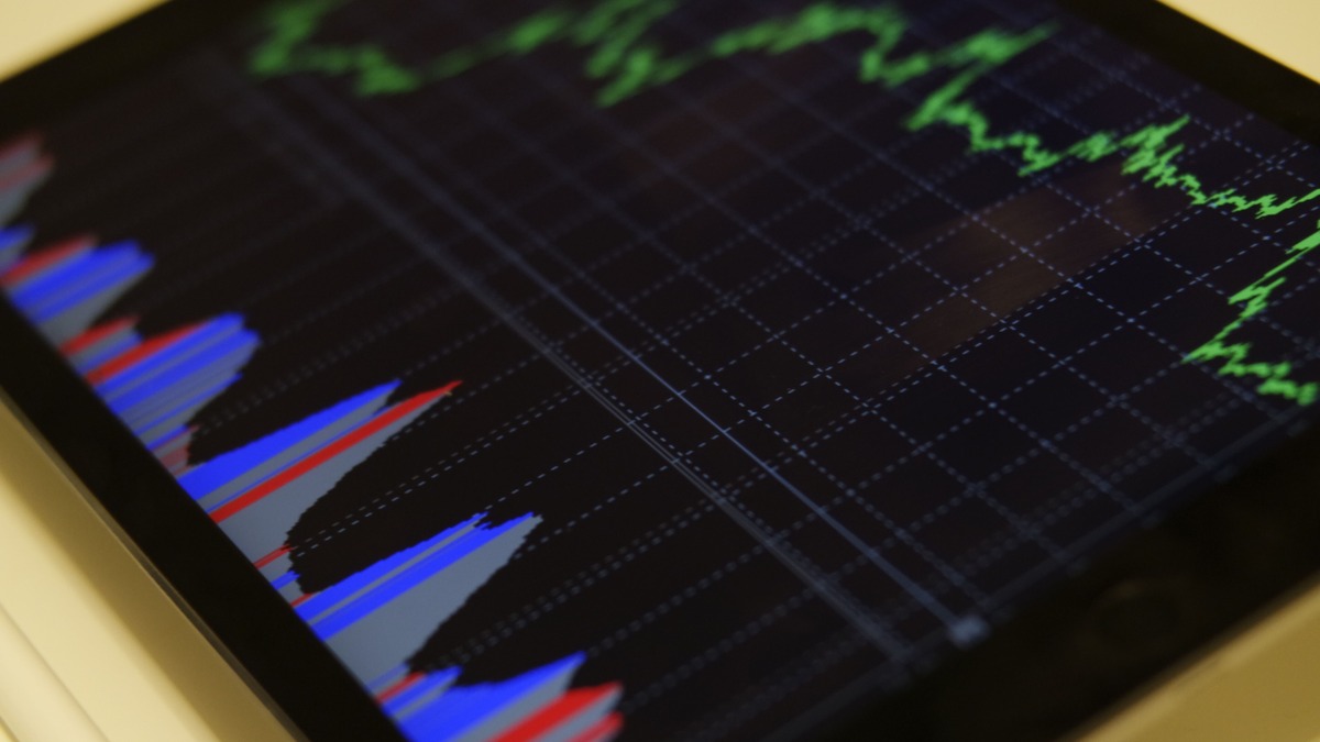 Stock trading chart on a tablet device showing market data