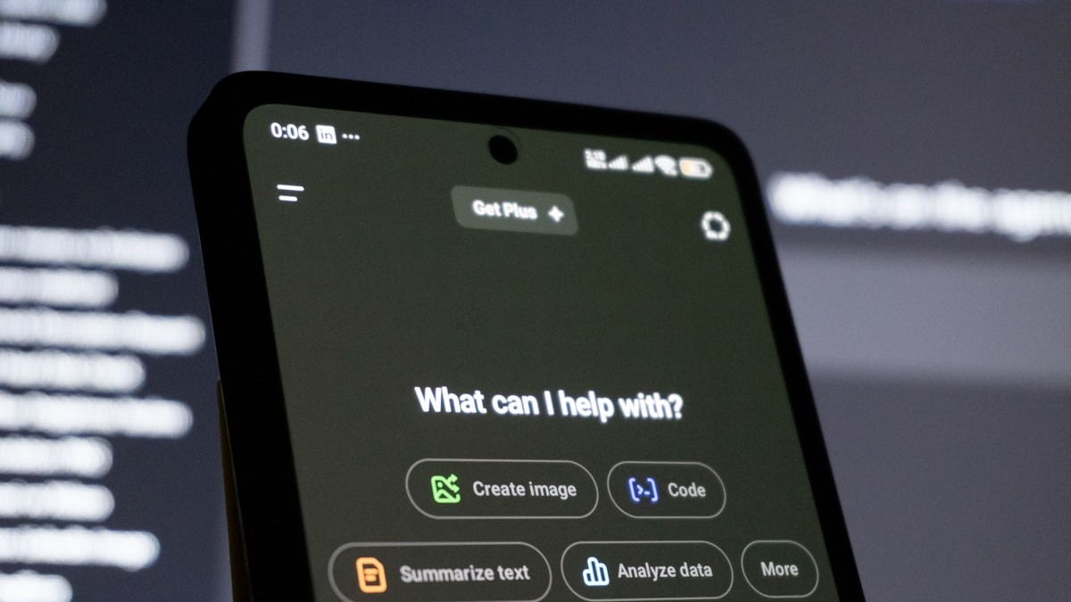 A smartphone displaying a ChatGPT conversation interface in close-up