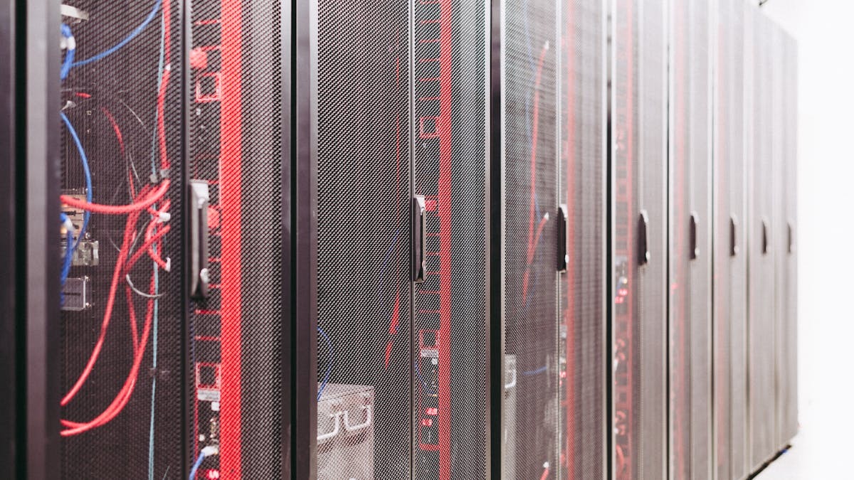 Server racks in a data center - the physical infrastructure behind cloud services like AWS