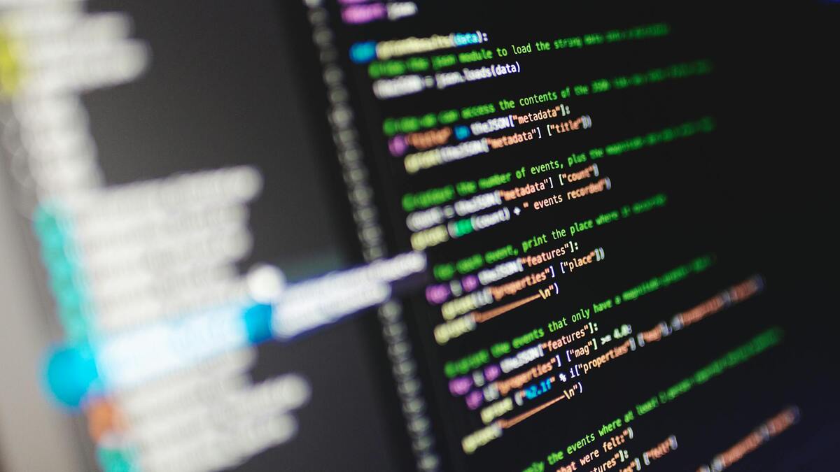 Developer code on monitor screen