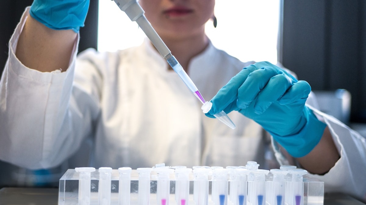 DNA sequencing laboratory equipment showing genetic analysis