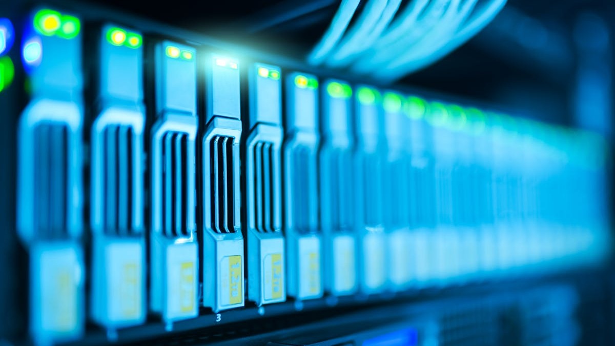 Server rack in a data center with blue indicator lights