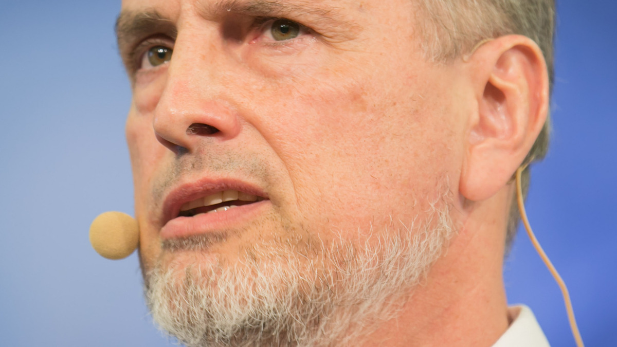 Jürgen Schmidhuber, co-author of the Neural Computers paper, speaking at an AI summit