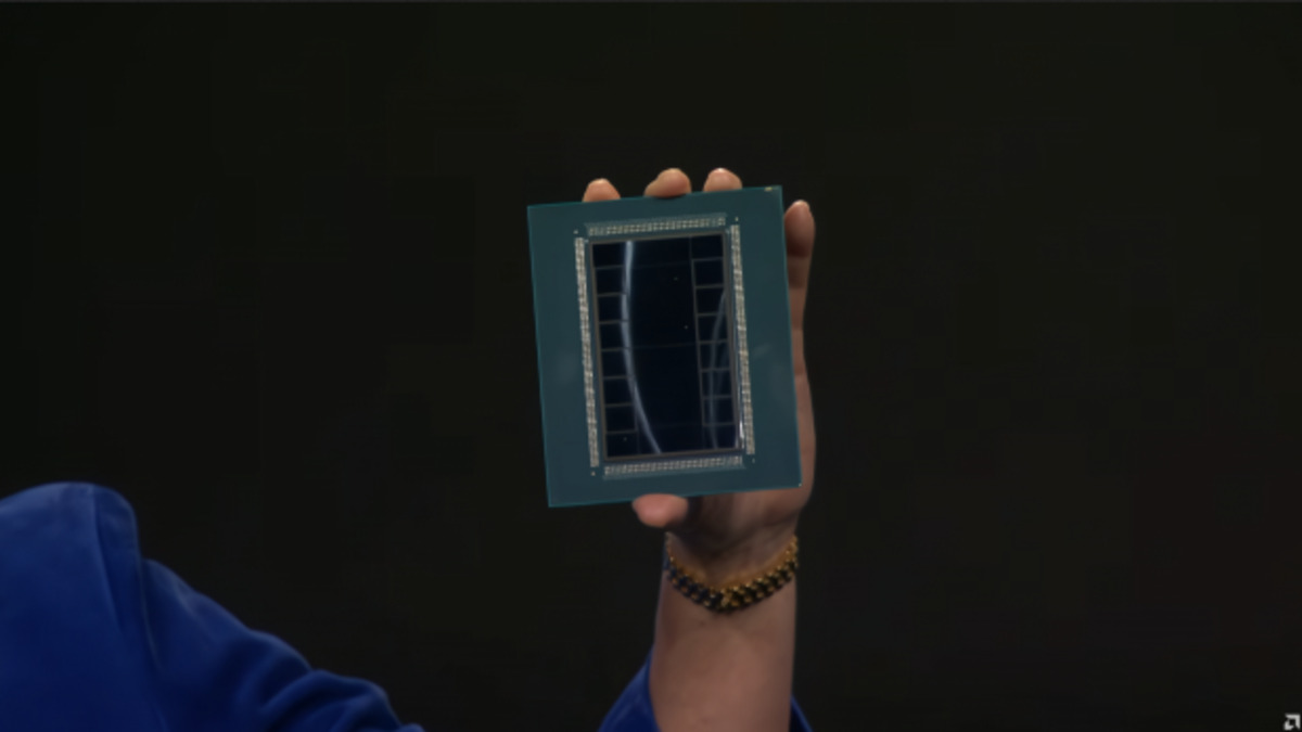 AMD CEO Dr. Lisa Su holding the Instinct MI455X GPU package