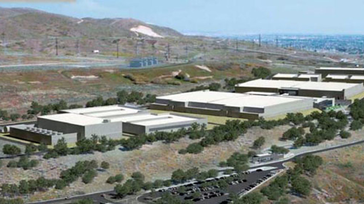 Aerial view of a large-scale data center campus, illustrating the density and scale of AI compute infrastructure
