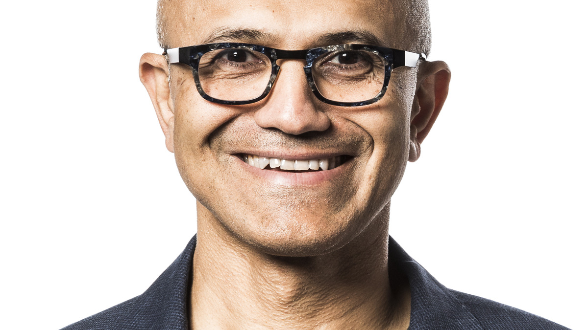 Satya Nadella smiling in an official portrait