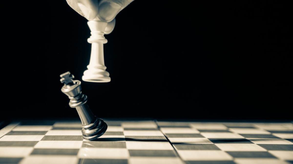 Chess pieces on a board, representing competitive strategy
