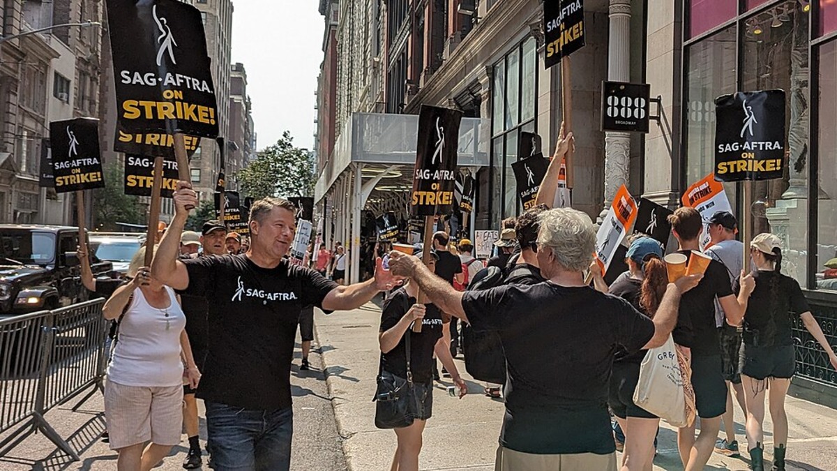 SAG-AFTRA members picketing in New York City during the 2023 actors' strike over AI and residuals