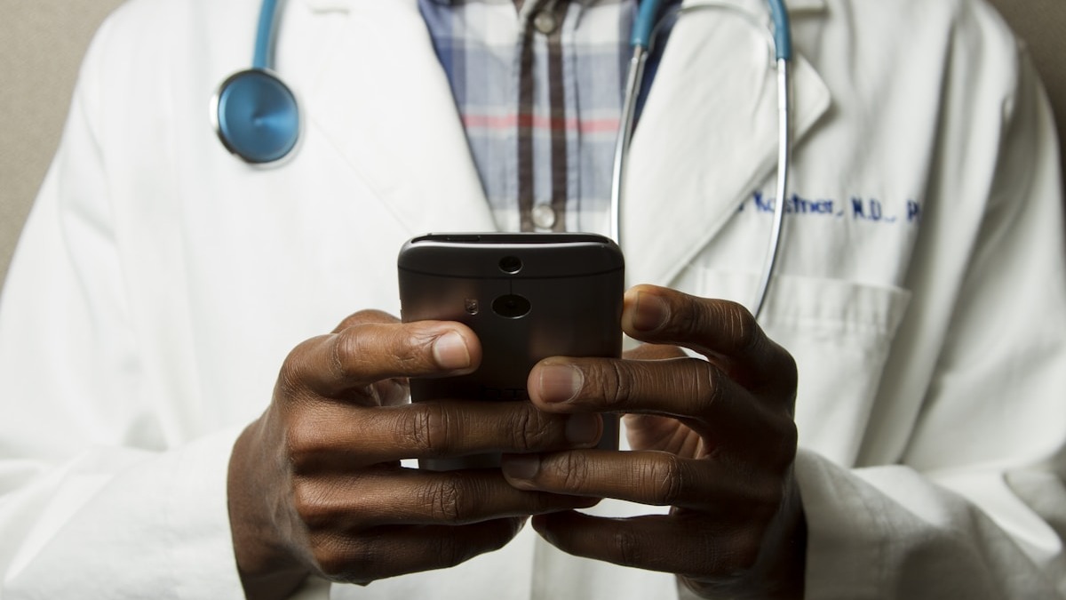 A stethoscope resting on a medical desk
