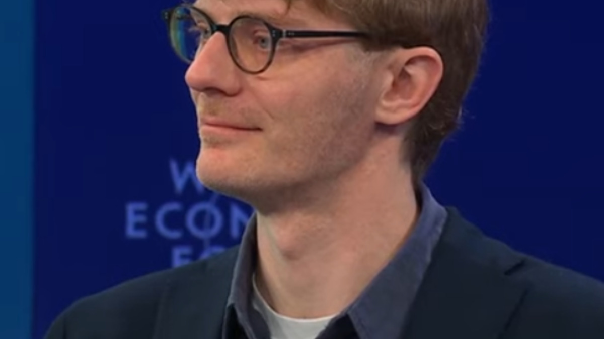 Richard Socher speaking on stage at the World Economic Forum