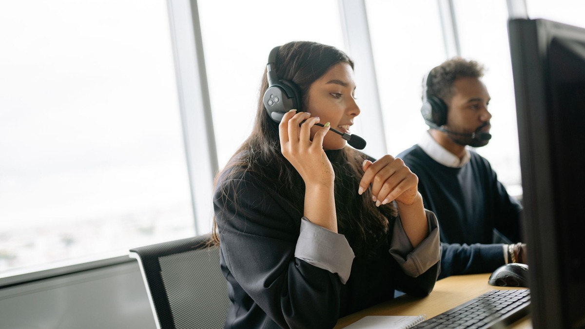 Customer service agents working in a modern support center