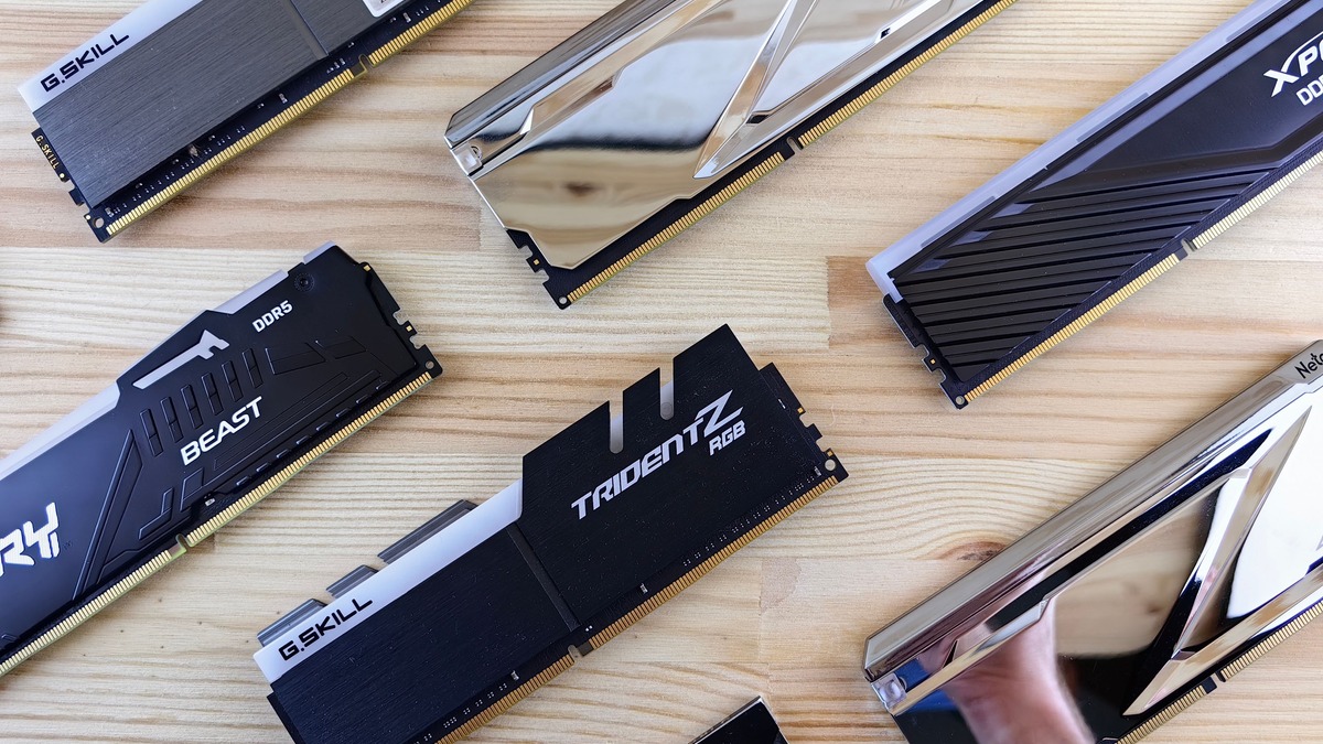 RAM memory modules arranged on a wooden surface