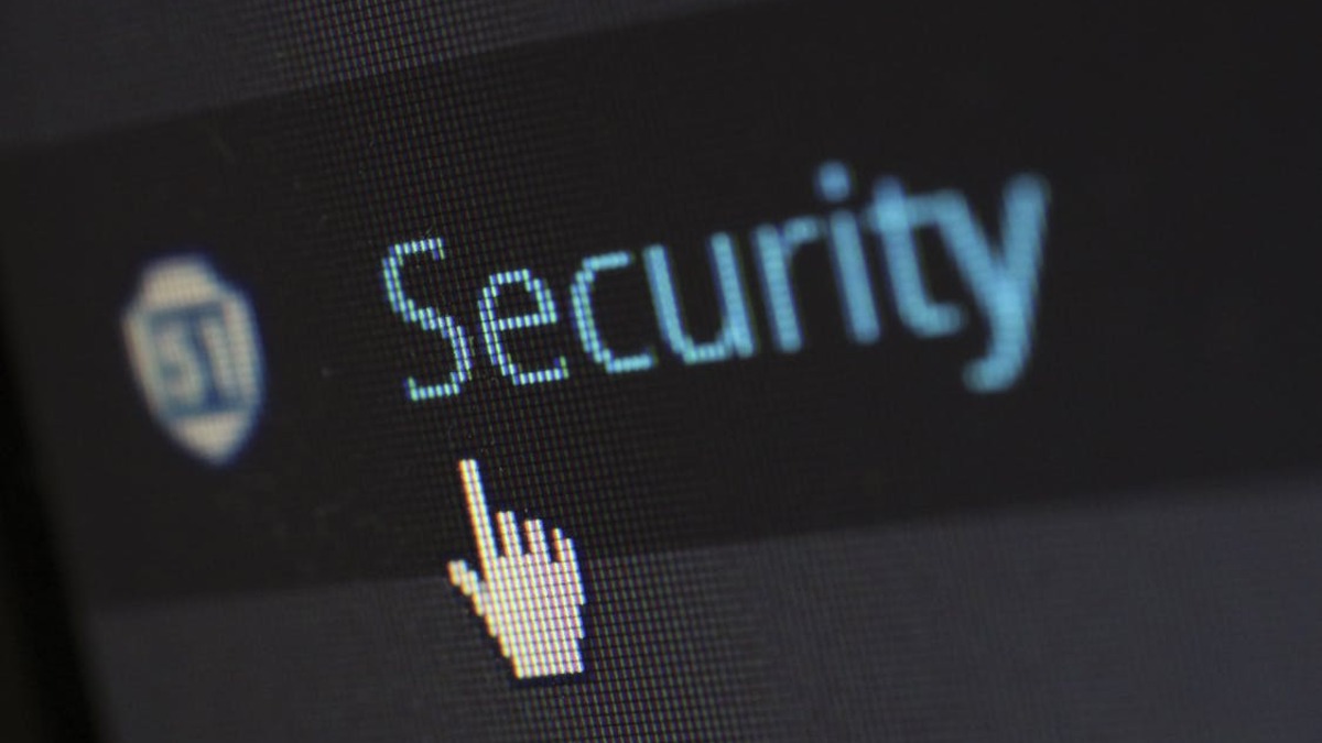 Digital security padlock and binary code representing AI-powered cybersecurity threats