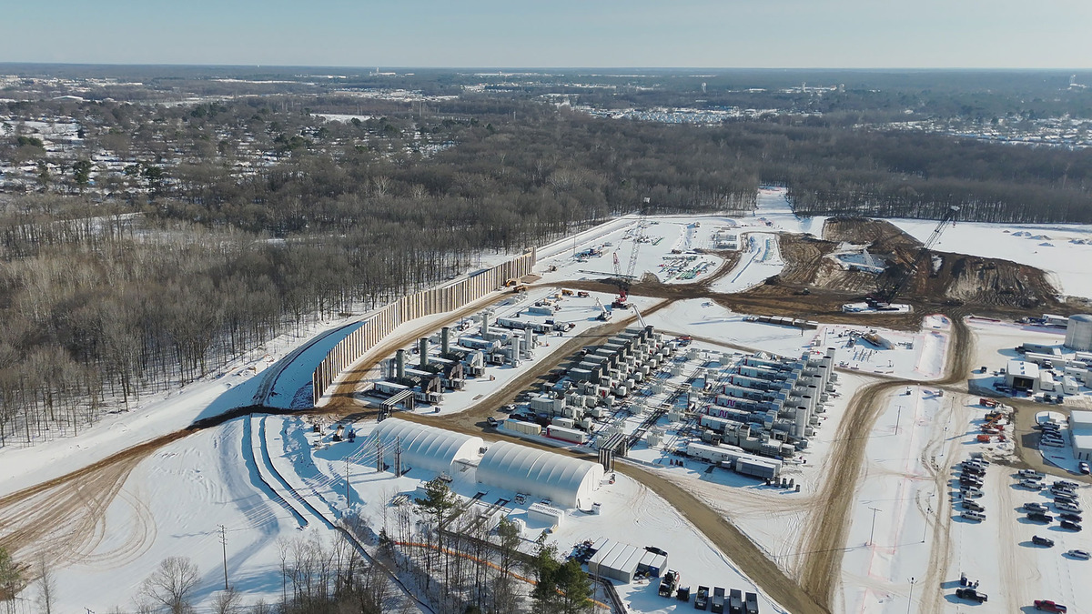 Aerial drone view of gas turbines lined up at xAI's Southaven facility