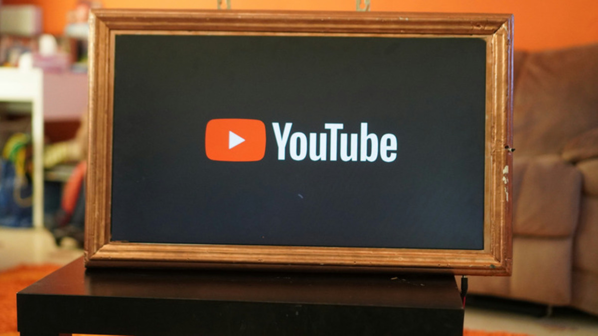 The YouTube platform displayed on a television screen