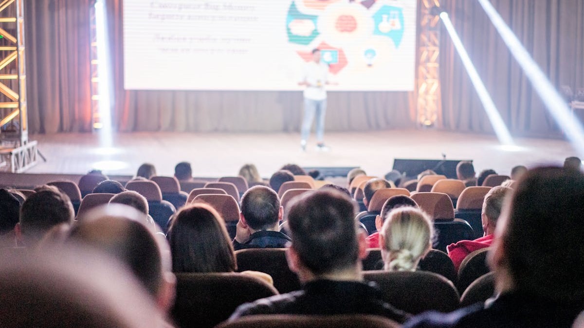 Project Glasswing partner logos shown at a security conference with a presenter on stage