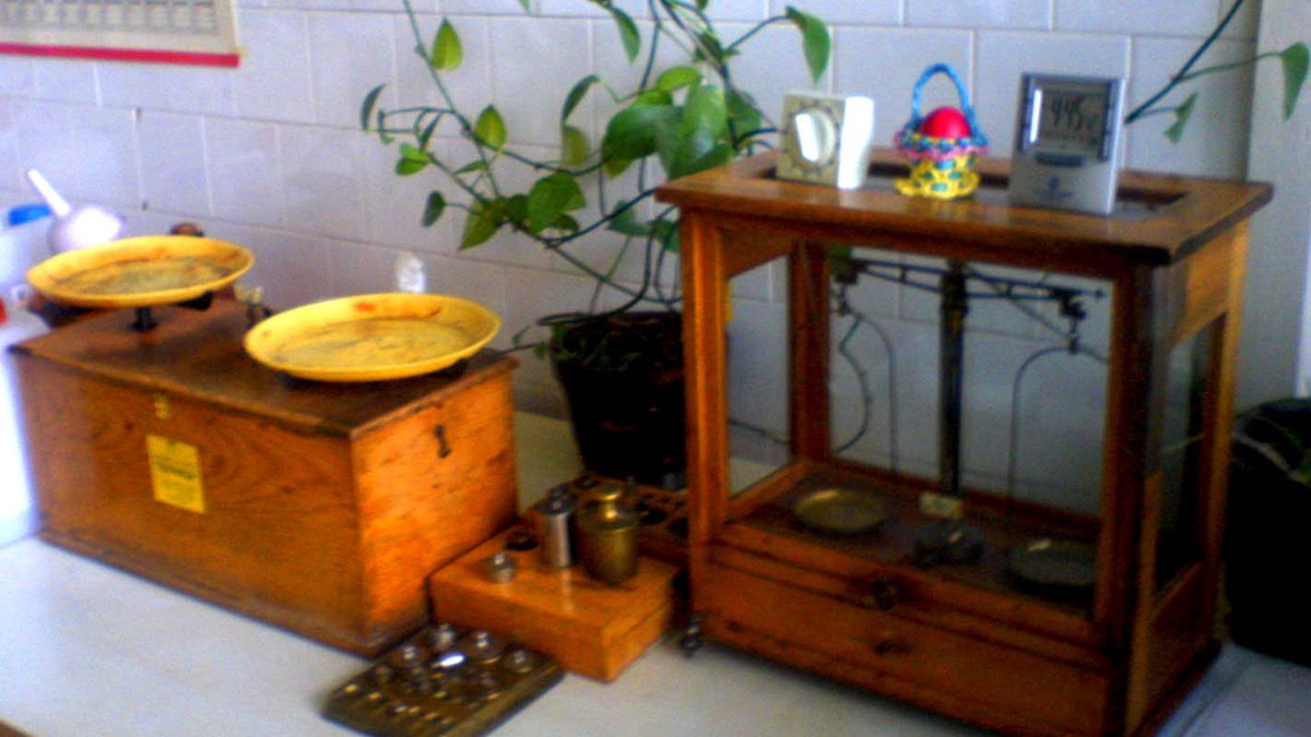 Old laboratory balance scales in a galenic pharmacy