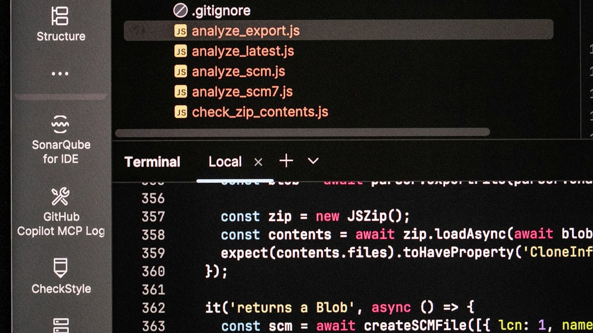 Computer screen showing terminal output and code
