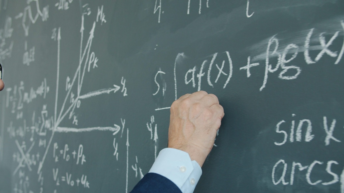 Mathematical formulas on a chalkboard illustrating symbolic logical structures