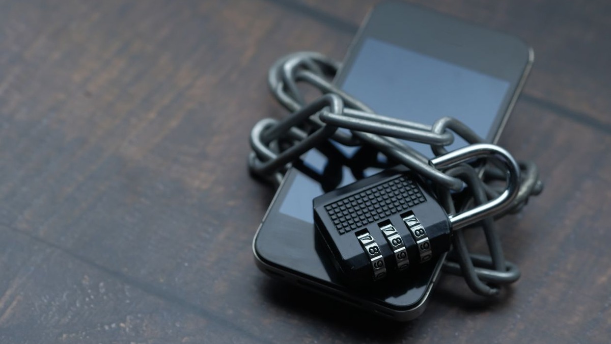 Padlock on smartphone representing digital security