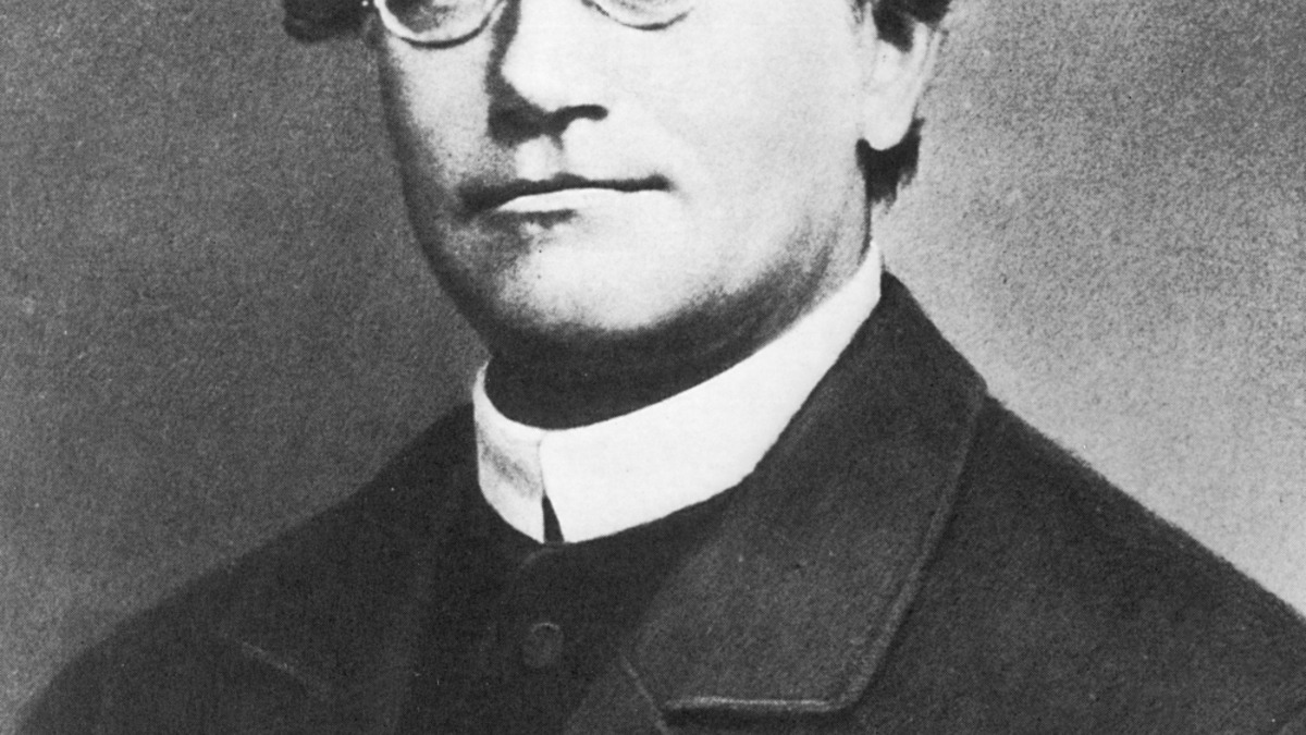 A monochrome portrait of Gregor Mendel, the 19th-century monk whose pea plant experiments founded modern genetics