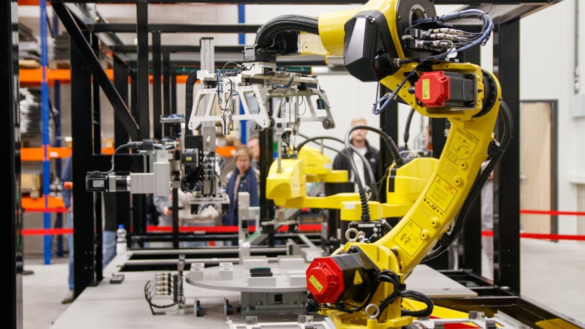 Industrial robotic arm in a modern manufacturing facility