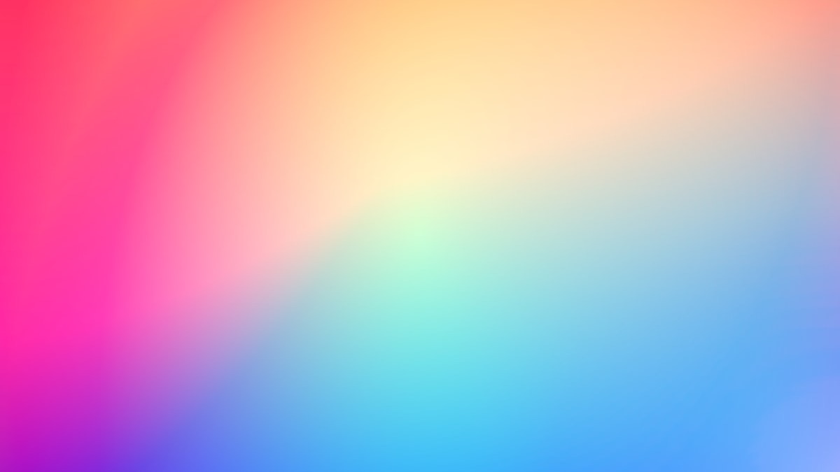 Colorful gradient and data visualization on a computer screen at a desk